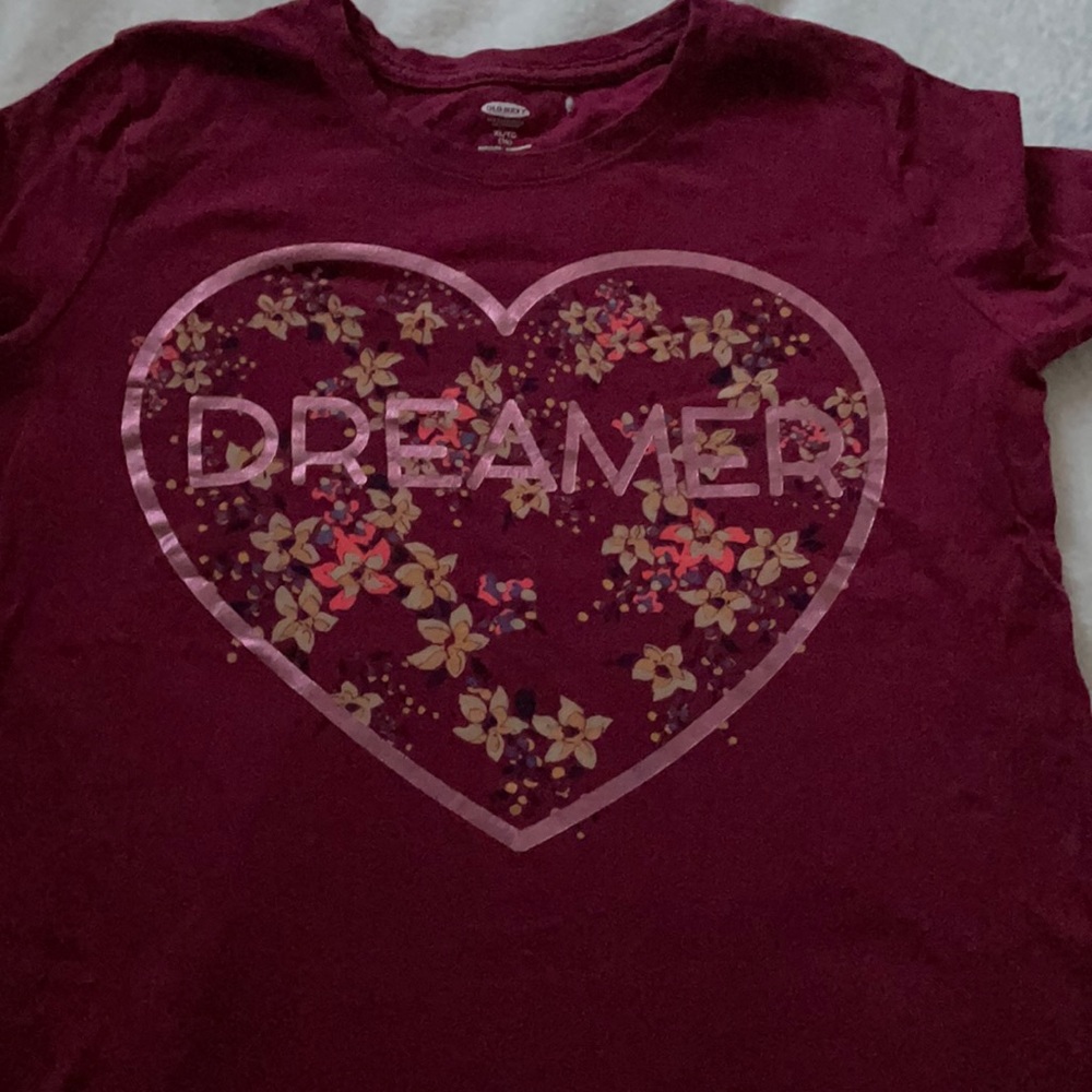 A pink and red heart tee shirt with flowers.